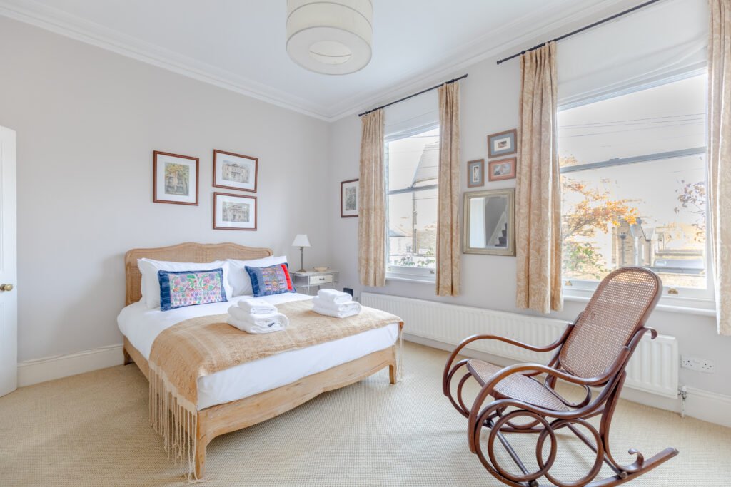 A property photo of a bedroom for a letting listing, neutral colours are used for decoration.