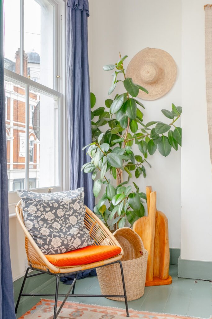 An armchair in the living room of a short-stay holiday house.